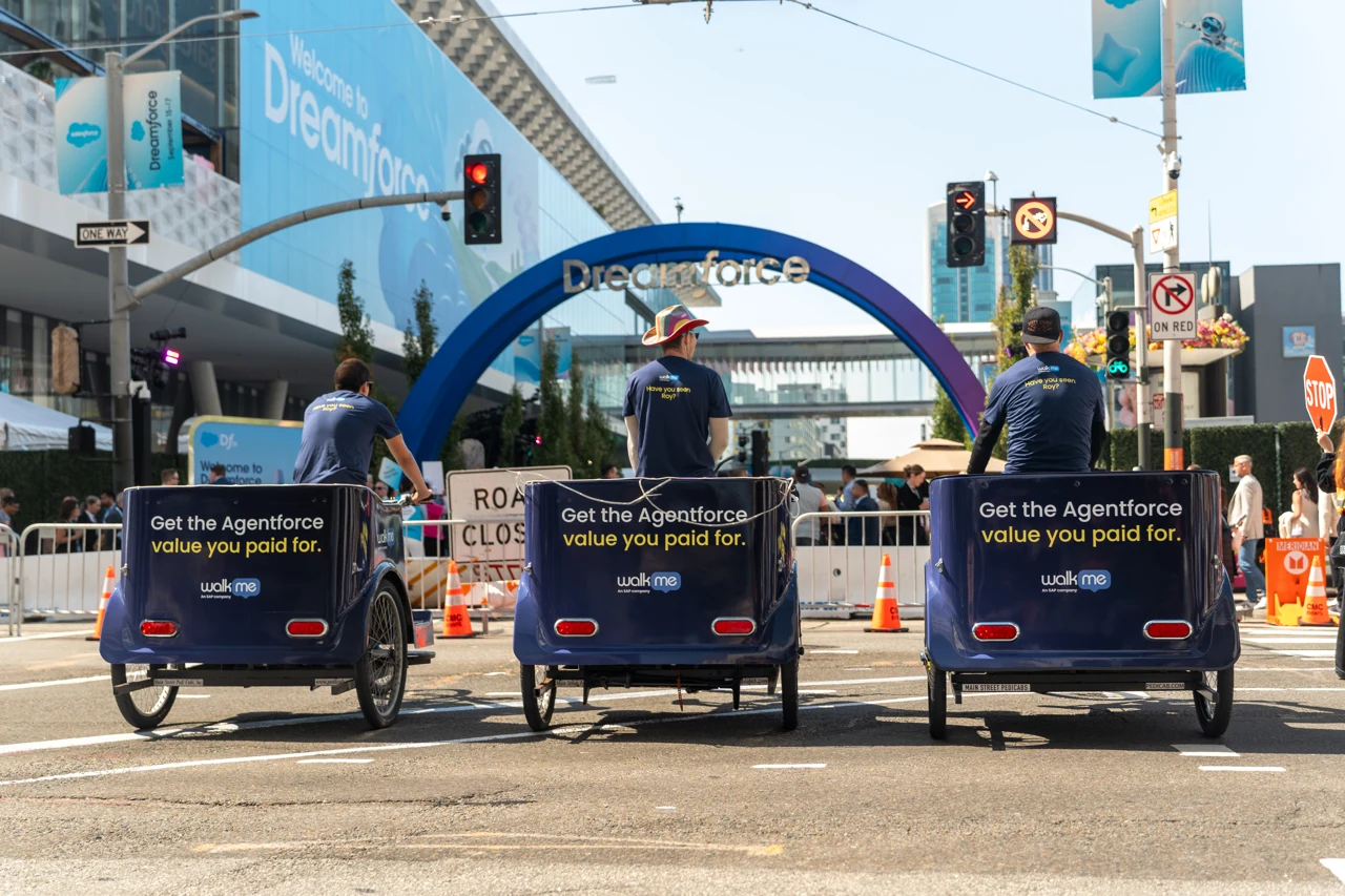 Three WalkMe pedicabs outside Dreamforce
