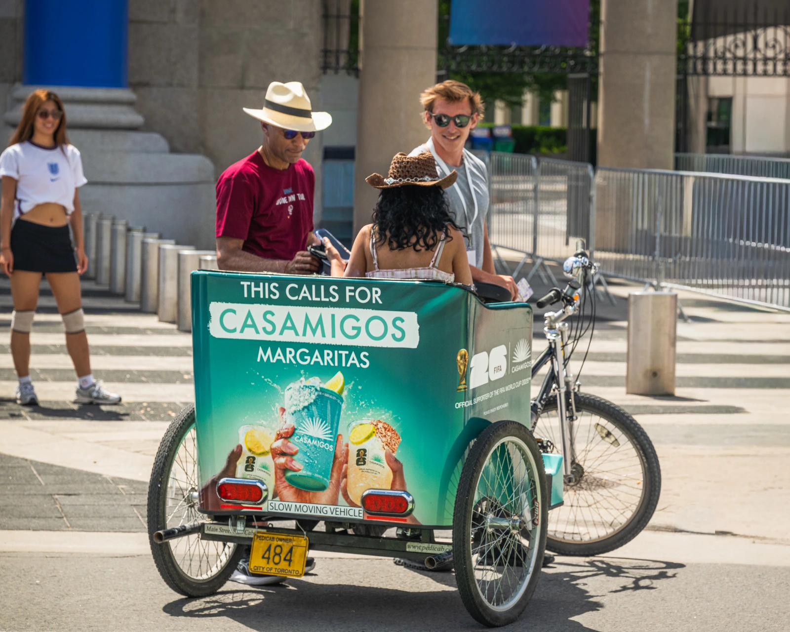 Casamigos branded pedicab with guests outside an event