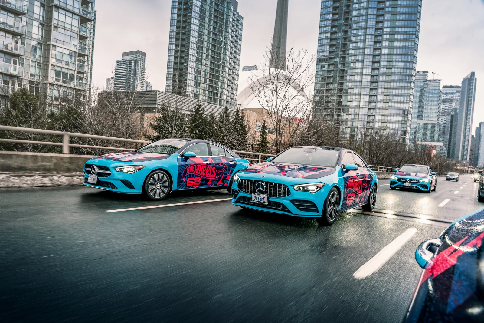 Hot Wheels wrapped Mercedes-Benz fleet driving through Toronto